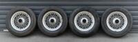 WIRE WHEELS: A set of&nbsp; four, 15 Inch Dunlop wire wheels with tyres, 72 spoke wheel, tyre rating 185/80R15, came off a Jaguar E-Type but thought to also suit a Jaguar Mk2, all tyres matching