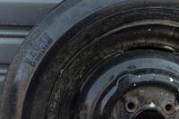 WHEELS: Three early English 14 inch, four stud wheels thought to be from a Morris Minor model, also includes one 15 inch, five stud wheel - 6