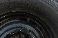 WHEELS: Three early English 14 inch, four stud wheels thought to be from a Morris Minor model, also includes one 15 inch, five stud wheel - 9