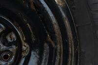 WHEELS: Three early English 14 inch, four stud wheels thought to be from a Morris Minor model, also includes one 15 inch, five stud wheel - 11