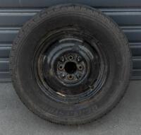 WHEELS: Three early English 14 inch, four stud wheels thought to be from a Morris Minor model, also includes one 15 inch, five stud wheel - 12
