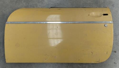 MG: An MGB left side door with chrome strip in mustard yellow colour