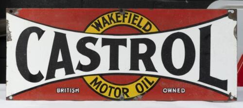 CASTROL: An original enamelled&nbsp;'Castrol Wakefield Motor Oil'&nbsp;sign to suit&nbsp;12 bottle oil racks, 30.5cm high, 76cm wide.