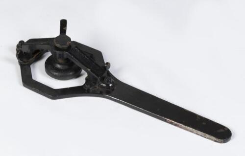 WHEEL SPANNER: An early wheel spanner as used on Rolls-Royce and others of the period, approx 40cm in length