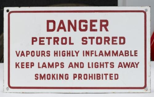 SIGN: A enameled 'Danger Petrol Stored' warning sign as used at service stations, 19cm high, 32cm wide