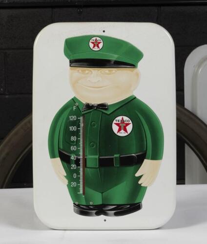 TEXACO: A reproduction tin thermometer featuring Texaco service station attendant, 40.5cm high, 28cm wide