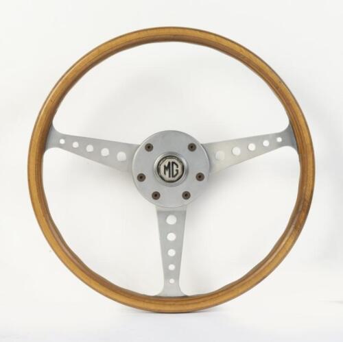 MG: A three spoked, wooden MG steering wheel, 38cm in diameter