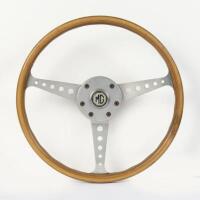 MG: A three spoked, wooden MG steering wheel, 38cm in diameter