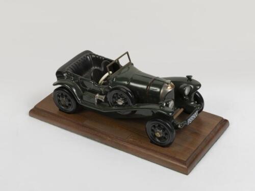 BENTLEY: A Coalport, made in England ceramic Bentley model presented on wooden base, with dedication plaque, model not fixed on base, 23cm long