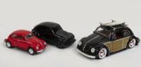 VW BEETLE: A group of three Volkswagen Beetle models