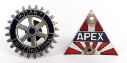 CLUB BADGES: Two club grille badges, includes a triangular APEX badge and a Rotary International badge