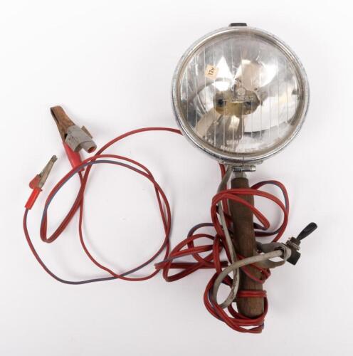 LUCAS: A Lucas sealed beam FT/LR 14 chrome light spot lamp fixed to wooden handle with power lead and battery clamps