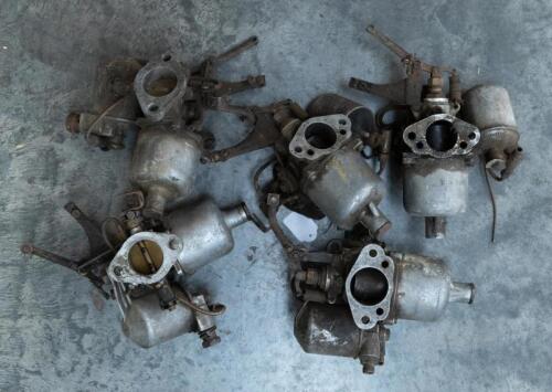 CARBURETTORS: A group of five SU carburettors with bulbs