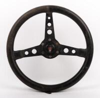 MOMO: A Momo Prototipo three spoke leather bound steering wheel with Rover horn pad