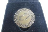 SILVERSTONE: Two Silverstone related items (Limited Edition book 375/1500 with Medallion) - 2