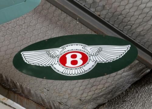 BENTLEY: A double sided enamel 'Bentley' oval shaped&nbsp;sign, approx 79cm wide