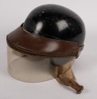 RACING HELMET: A circa 1950s Everoak racing helmet with visor, some marks&nbsp;to the top&nbsp;