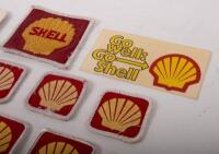 SHELL: An assortment ten of Shell cloth patches of varying sizes, also includes a 'Go Well - Go Shell' adhesive sticker - 3