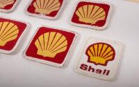 SHELL: An assortment ten of Shell cloth patches of varying sizes, also includes a 'Go Well - Go Shell' adhesive sticker - 4