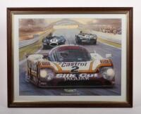 LE MANS: A print featuring the 1988 Le Mans Jaguar XJR-9 'Silk Cut Jaguar' #2, by Michael Turner titled 'The winning Jaguars at Le Mans' framed and glazed, 63.5cm wide, 50cm high overall. - 2