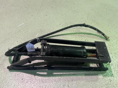 FOOT PUMP: An early foot&nbsp;operated tyre pump complete with hose