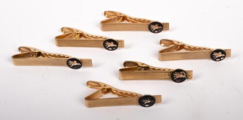 MOBIL: A collection of six Mobil tie pins featuring inset stones in the styles&nbsp;of white/colourless diamond, emerald, ruby, and sapphire, maker unknown however each stamped to rear '12012KGF' likely&nbsp;awarded to an employee for various levels of service