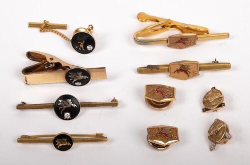 MOBIL: An excellent collection of Mobil employees tie pins and lapel pins comprising&nbsp;three&nbsp;'5 year' service pins, one '3 year' service pin one 15 year service pin and a collection of three items with inset stones in the style of white/colourless diamonds.