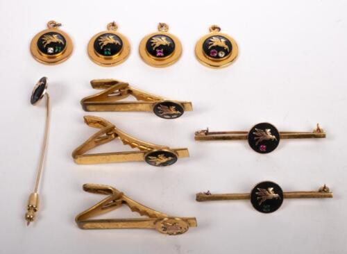 MOBIL: A collection of ten&nbsp;Mobiloil&nbsp;items including tie pins, & lapel pins, many produced and marked to reverse with 'Stokes' all with inset stones in style of white/colourless diamond, emerald, sapphire and ruby, many marked to reverse with 9 & 10 karat 