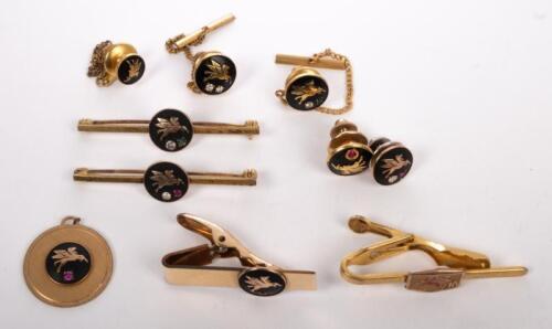 MOBIL: A collection of ten Mobiloil&nbsp;items including tie pins and lapel pins. One tie pin marked with '10' years service, others with inset stones in style of white/colourless diamond, emerald, and ruby