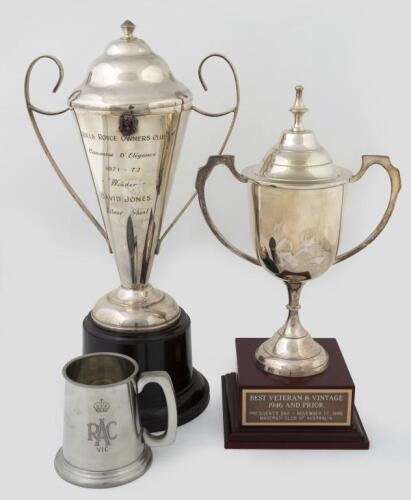 TROPHIES: A group of three trophies