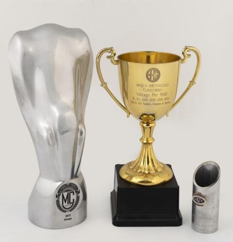TROPHIES: A group of three trophies, including a large 2013 Motorclassica Concours d'Elegance trophy