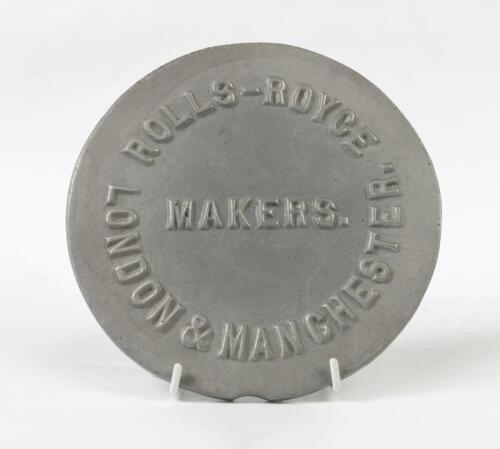 ROLLS ROYCE: A cast alloy 'Rolls-Royce Makers. London & Manchester.' round plaque, 19.5cm diameter