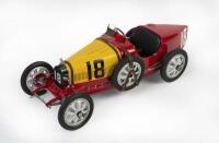 TYPE 35: A highly detailed 1:18 scale model of a Bugatti Type 35 Grand Prix&nbsp;1924 in red & yellow 'National Project Spain'&nbsp;by CMC&nbsp;