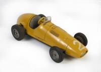 TIN TOY: A c1950s tin toy model of a Grand Prix racing car, likley modelled of a Ferrari or Maserati, made in Italy by Lima, approx 22cm long