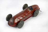 TIN TOY: A c1950s clockwork/wind up racing car by Mettoy Great Britain, 29cm long