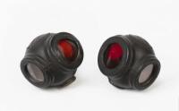 HELMET LAMPS: A pair of pre-war Rubbolite helmet tail lamps, with both clear and red lenses, 10cm high, 8cm wide