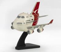 QANTAS: A shortened Qantas 747 novelty model mounted to display stand,&nbsp;24cm wingspan