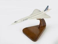 CONCORDE: A small scale Air France Concorde mounted to display stand, 22cm long, 9cm wingspan