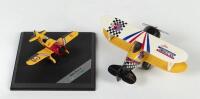 MODEL PLANES: Two small model planes, a John American pull back biplane and a Hongwell&nbsp;Granville Gee Bee Z, fixed to base