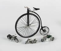 MODELS: A group of three approx&nbsp;1:64 scale motorcycles comprising a&nbsp;Matchbox 1914 Sunbeam, an MV Agusta&nbsp; a&nbsp;large 'Penny&nbsp;Farthing' style bicycle and a small motorcycle with sidecar&nbsp;