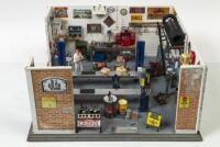 DIORAMA: An excellent 1:18 scale workshop diorama by Alpine Display Cases titled 'DJ Auto Repairs' - 2