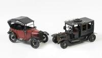 TIN MODELS: Two handmade tin model pre-war cars, both measure&nbsp;25cm long