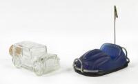 PERFUME BOTTLE: A glass perfume bottle shaped as an early motor car with cork