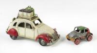 CITROEN: A handmade, tin, Citroen 2CV with surfboardsr, 24cm long, and a&nbsp;handmade model car made with everyday household products, e.g. Coca-Cola bottle caps for wheels etc