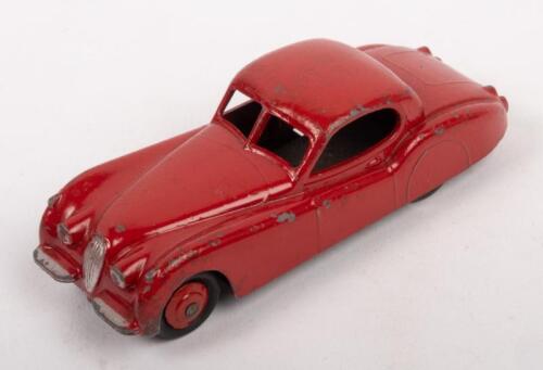 JAGUAR: A c1950s Dinky Toys No.157 Jaguar X120 in red, Made in England by Mecanno