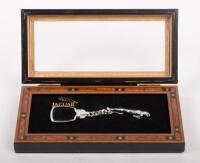 JAGUAR: A sterling&nbsp;silver leaping Jaguar keyring in wooden presentation box