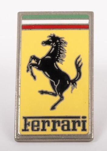 FERRARI: A fine enamel Ferrari prancing horse one pin badge