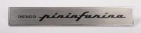 PININFARINA: A PF57 'Disegno DI Pininfarina' plastic body badge as used on Alfa Romeo & Ferrari models, 14.5cm long
