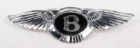 BENTLEY: A chromed winged 'Bentley' badge, 16cm long.