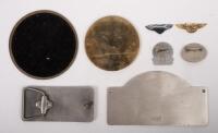 BENTLEY: A group of Bentley related items comprising a&nbsp;Bentley Belt buckle, two small winged Bentley logo pins, National Bentley Rally 2008 plaque, a Bentley coaster, a RREC Flemish Section badge and two others - 2